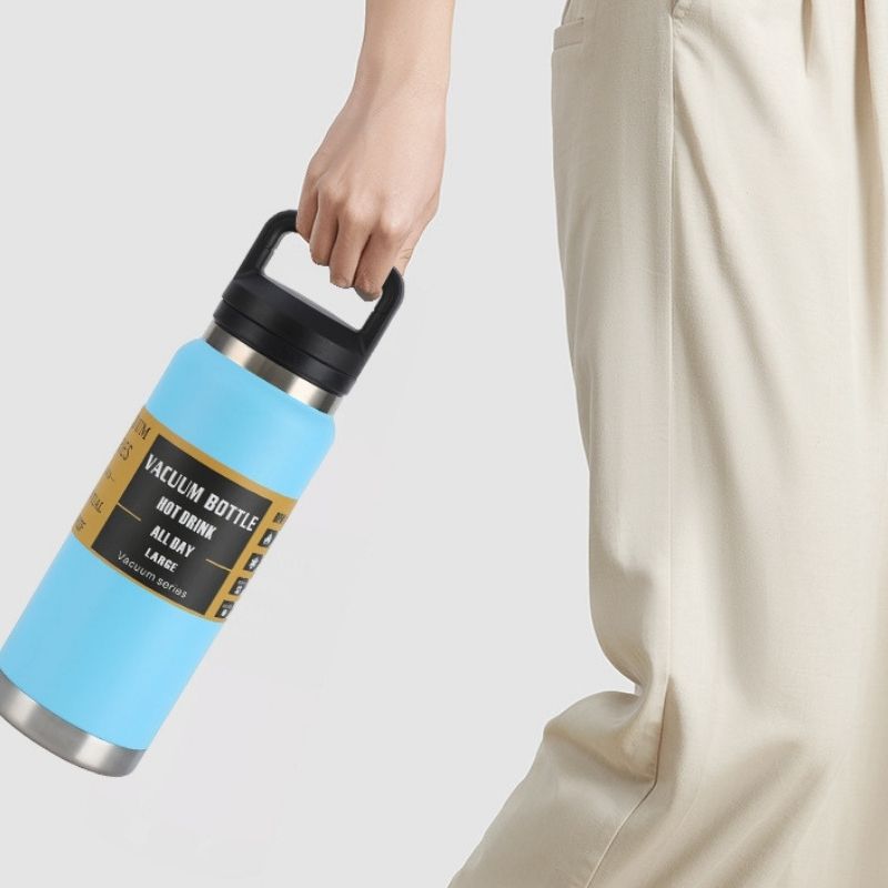 Model Holding Portable Insulated Water Jug for Hiking