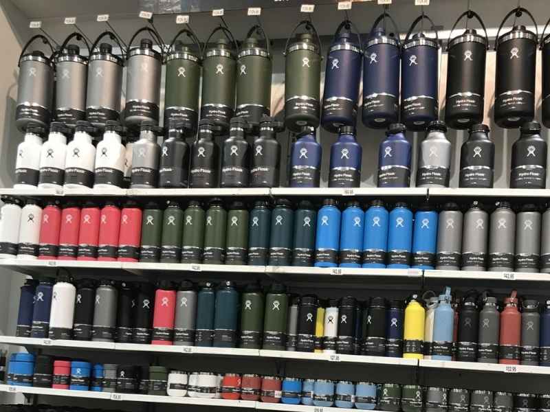 retail shelf with large jugs
