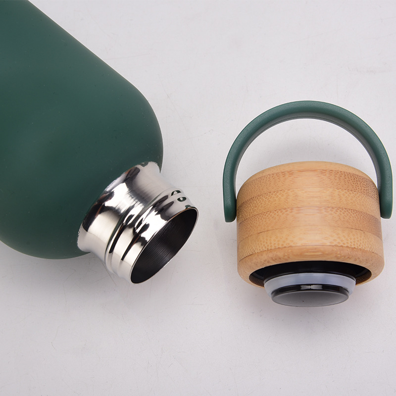 Threaded narrow mouth insulated bottle with stainless steel interior and wooden lid