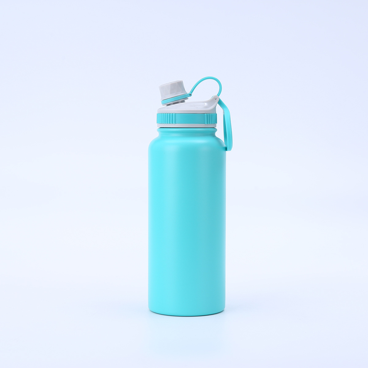 Peacock blue 32oz insulated bottle with spout lid and carry handle