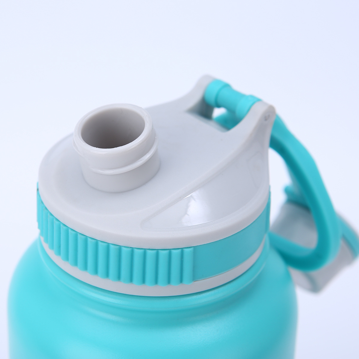Side view of spout lid showing drinking spout