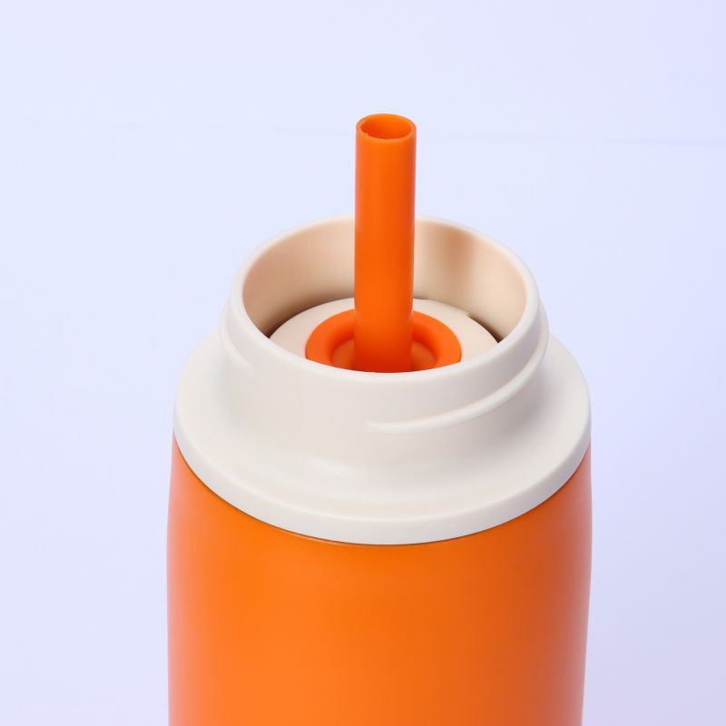 Straw spout detail on kids insulated bottle lid
