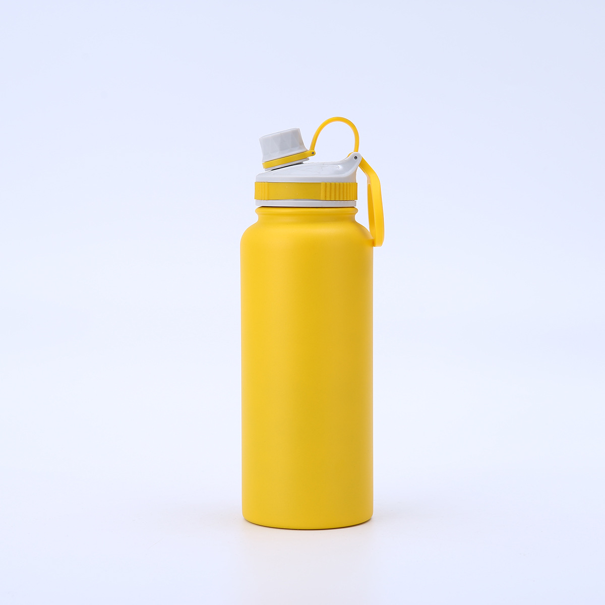 Yellow 32oz insulated bottle with spout lid and carry handle