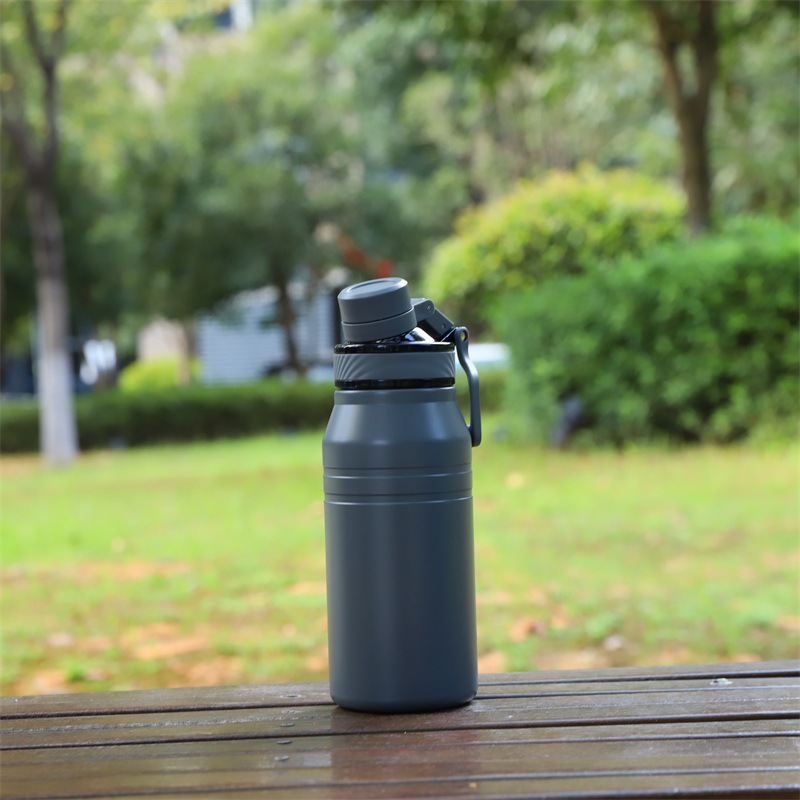 gray stainless steel thermal bottle with spout lid