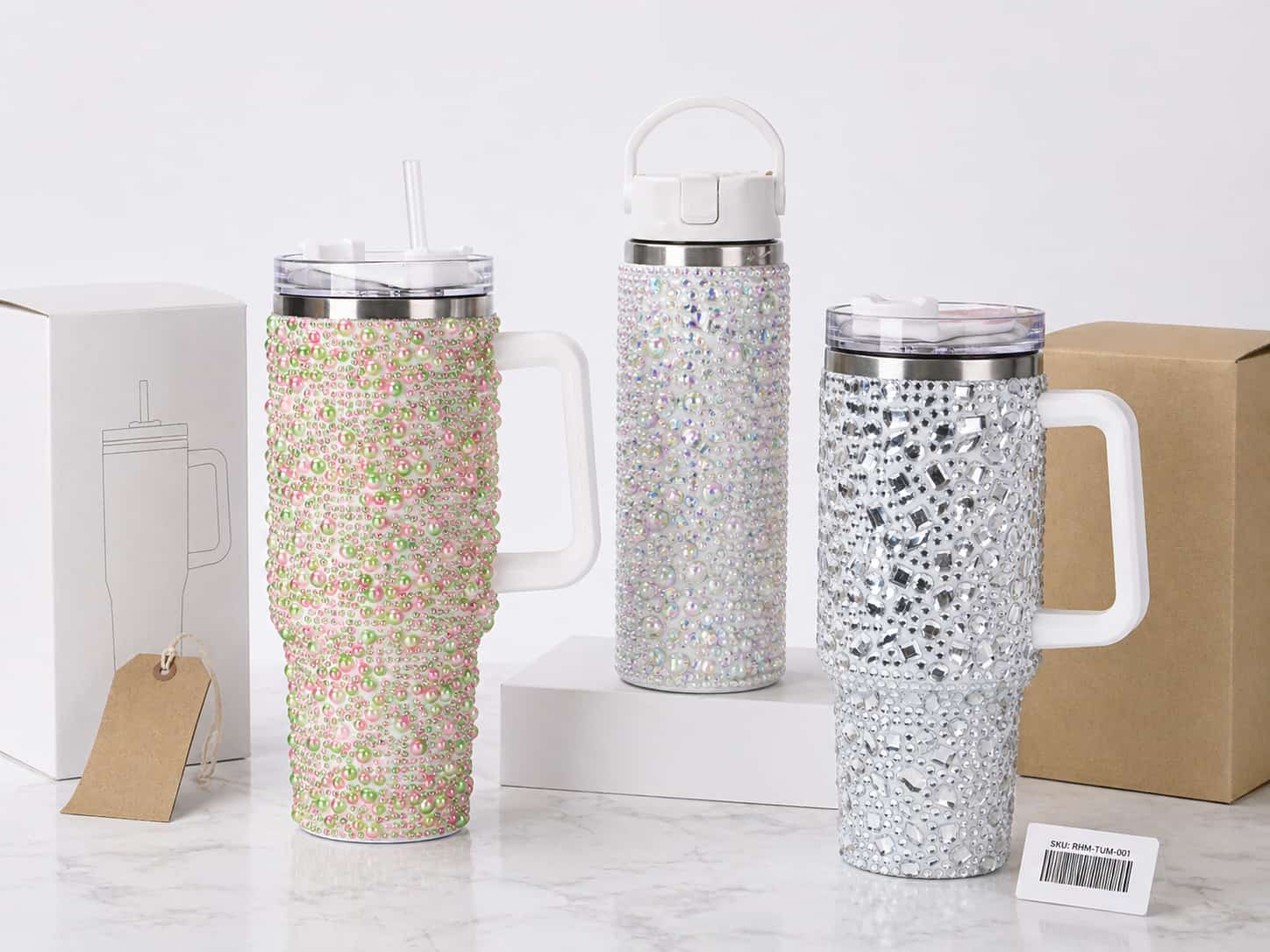 Rhinestone tumblers and bottle with custom packaging boxes, hang tag, and SKU label for boutique retail and e-commerce display