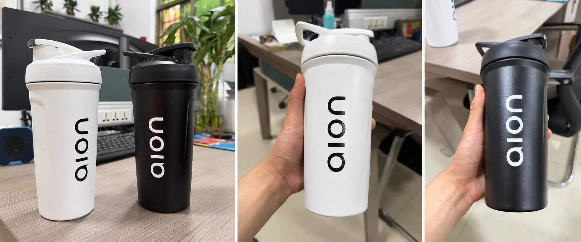 Custom 24oz 316 stainless steel protein shaker cups in black and white with single-color 3D logos, shown as sample cups for a U.S. fitness brand gift project.