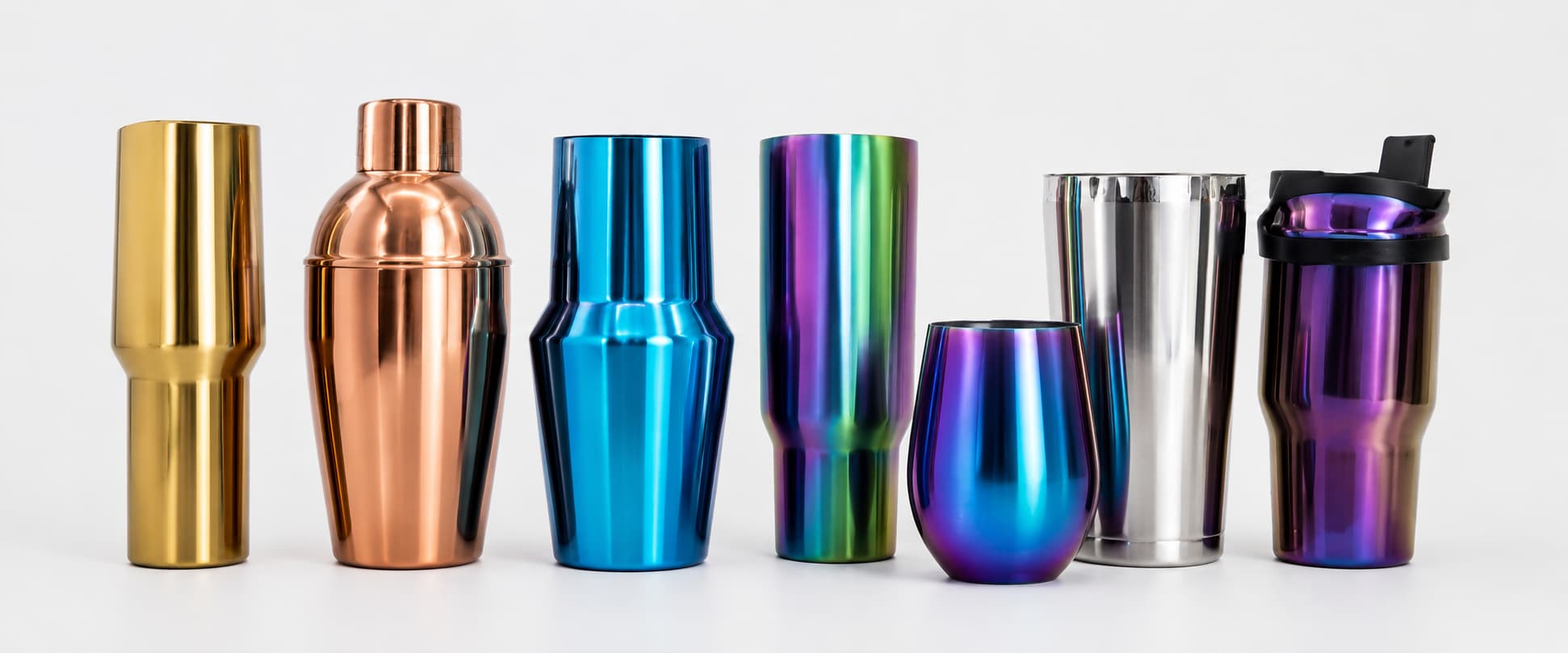 Stainless steel bottles with different plating finishes including gold, rose gold, blue, iridescent, and metallic effects for custom drinkware surface treatment